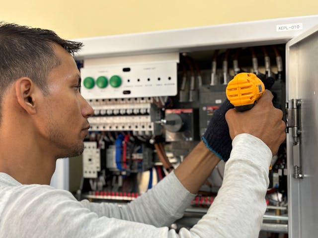 Purco Electric team working on commercial project